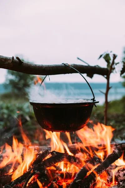 Fish soup to cook on fire in nature.