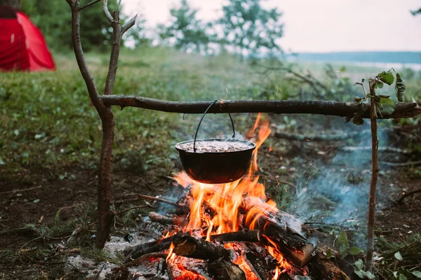 Fish soup to cook on fire in nature.
