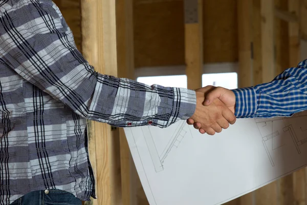 Architect and Client Showing Handshake Gesture