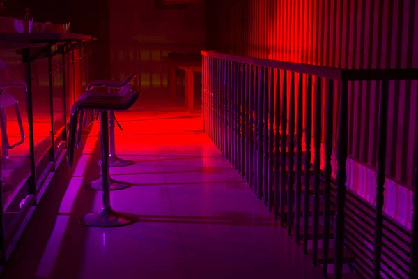 Interior of a nightclub with colorful lighting
