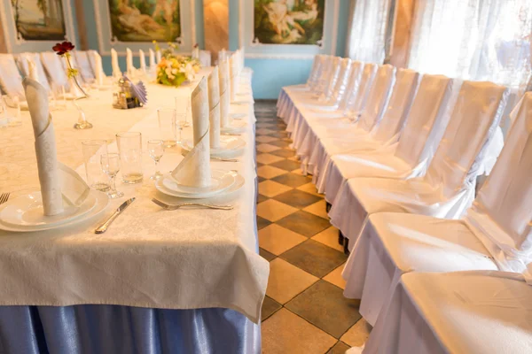 Elegant table and seating at a wedding