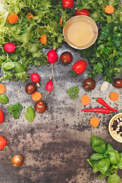 Salad ingredients on concrete board