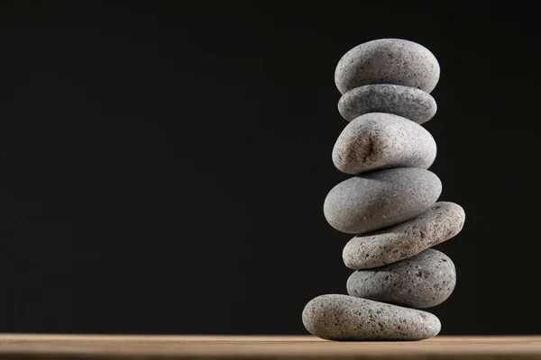 Pile of pebbles with back background