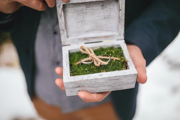 Wedding rings in wooden box
