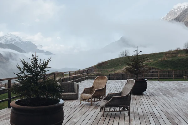 On the terrace with mountains views