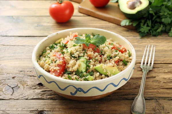 Vegetarian Quinoa salad in ceramic bowl