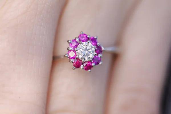 Woman\'s hand with a Ruby-Diamond ring