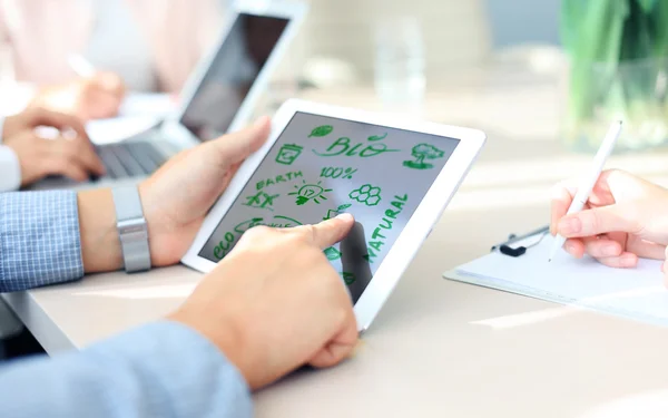 Business person using a touch screen