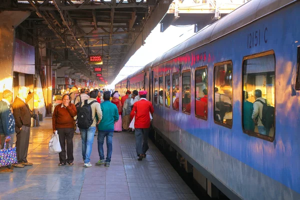 JAIPUR, INDIA - NOVEMBER 15: Unidentified people walk at Jaipur Junction Railway Station on November 15, 2014 in Jaipur, India. Jaipur station alone deals with 35,000 passengers in a day.