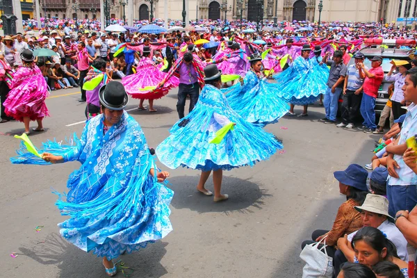 LIMA, PERU-JANUARY 31: Unidentified women perform during Festival of the Virgin de la Candelaria on January 31,2015 in Lima, Peru. Core of the festival is dancing performed by different dance schools