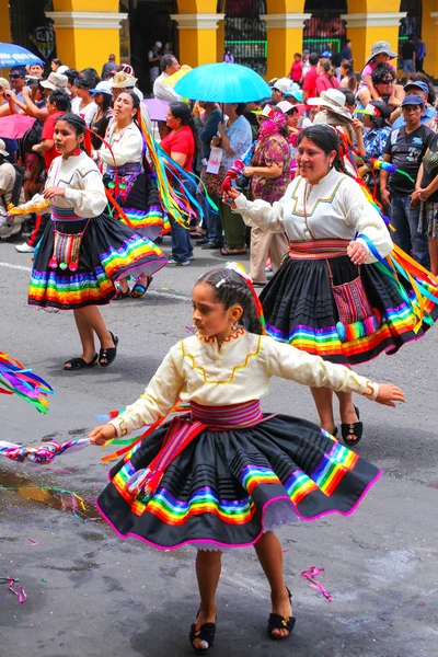 LIMA, PERU-FEBRUARY 1: Unidentified women perform during Festival of the Virgin de la Candelaria on February 1,2015 in Lima, Peru. Core of the festival is dancing performed by different dance schools