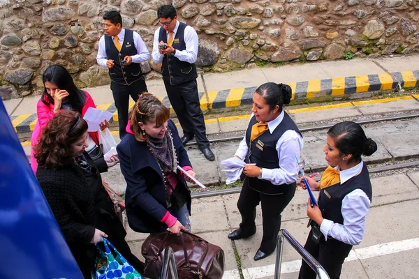 OLLANTAYTAMBO, PERU - JANUARY 18: Unidentified people board tour