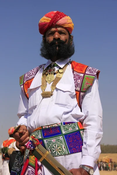 JAISALMER, INDIA - FEBRUARY 16: Unidentified man takes part in Mr Desert competition on February 16, 2011 in Jaisalmer, India. Main purpose of this Festival is to display colorful culture of Rajasthan