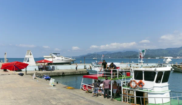 People visit the port in Batumi