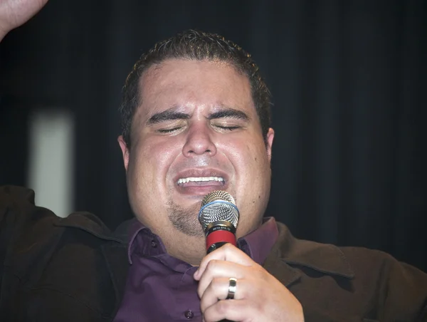 Reverend Edgar J. Cruz  performing during a Christian