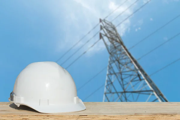 Engineering and safety helmet resting on the profile of the industry.