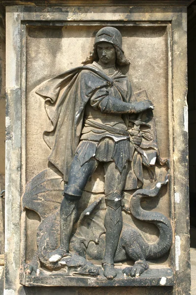Bas-relief in Dresden. Knight fight with dragon.