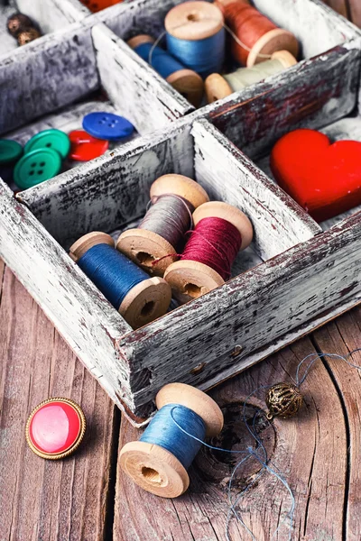 Box with sewing accessories