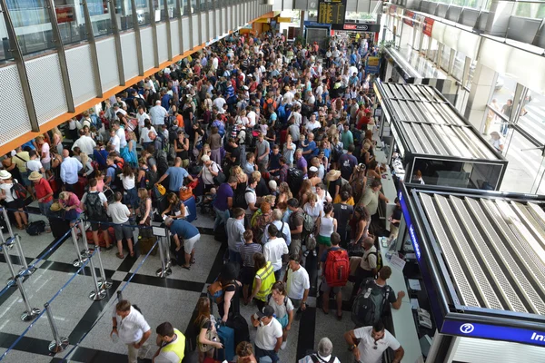Crowd of people in the Split airport queue