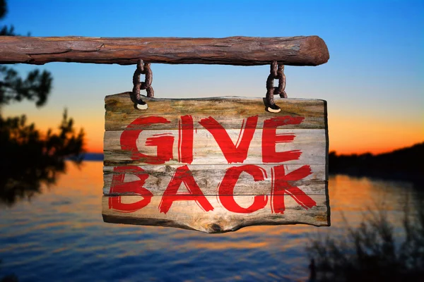 Give back motivational phrase sign