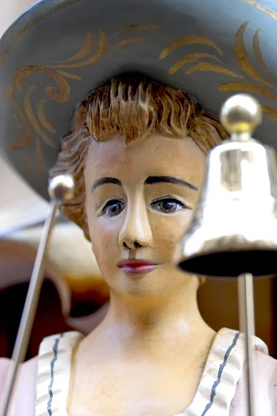 Female figure on a barrel organ