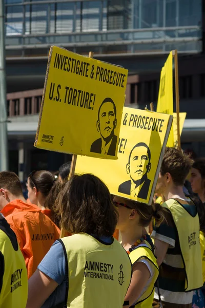 Amnesty International activists protest at Potsdamer Platz