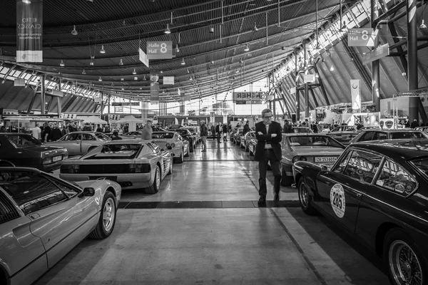 Different cars in the exhibition hall.