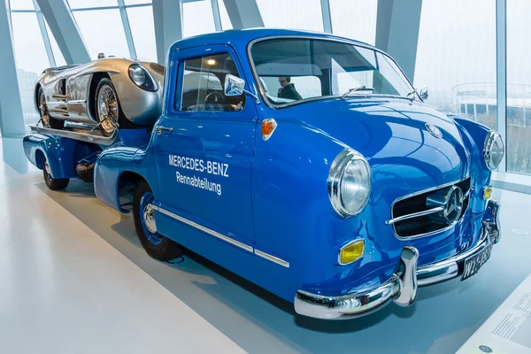 The high-speed racing car transporter Mercedes-Benz (Blue Wonder) and racing sports car Mercedes-Benz 300 SLR on the trailer, 1955.
