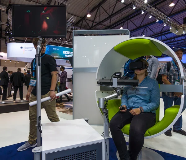 The stand of Airbus Group. Flight simulator based on virtual reality glasses Oculus Rift.