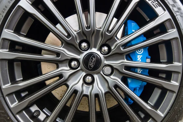 The brake system and wheel of compact car Ford Focus RS (third generation), close-up