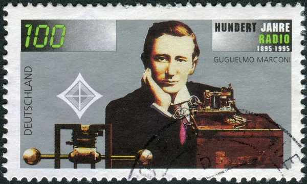 Postage stamp printed in Germany, dedicated to the 100th anniversary of the invention of radio, shows an engineer, physicist and Nobel Prize winner, Guglielmo Marconi