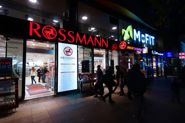 Drugstore Rossmann in night illumination. Rossmann - is Germany\'s largest retail chain drugstore, 1,900 branches and 28,000 employees.