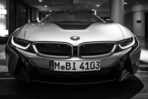 BERLIN - NOVEMBER 28, 2014: Showroom. The BMW i8, first introduced as the BMW Concept Vision Efficient Dynamics, is a plug-in hybrid sports car developed by BMW. Black and white