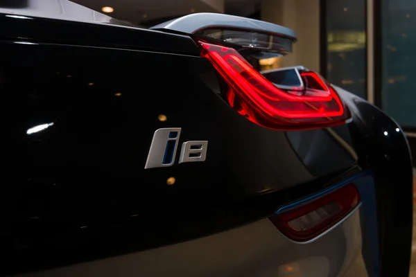 BERLIN - NOVEMBER 28, 2014: Showroom. The rear lights of the car BMW i8, first introduced as the BMW Concept Vision Efficient Dynamics, is a plug-in hybrid sports car developed by BMW.