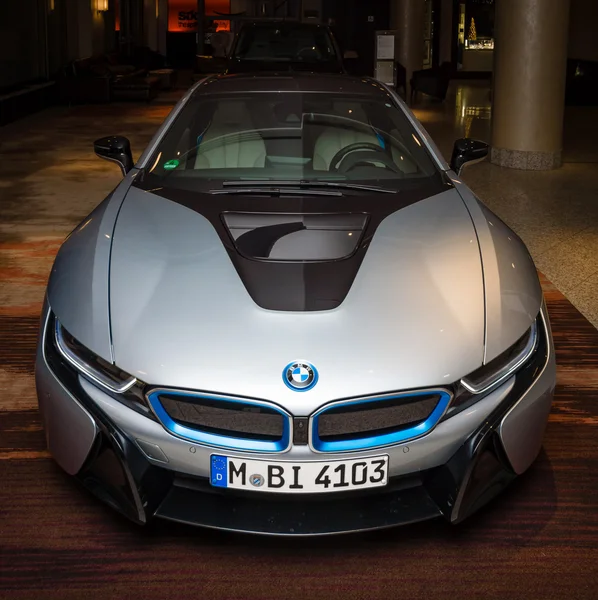 BERLIN - NOVEMBER 28, 2014: Showroom. The BMW i8, first introduced as the BMW Concept Vision Efficient Dynamics, is a plug-in hybrid sports car developed by BMW