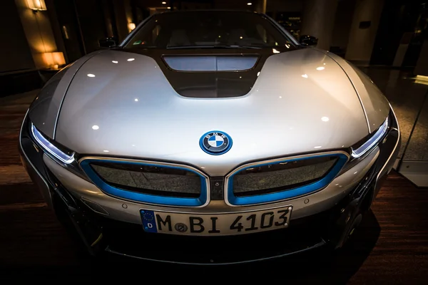 BERLIN - NOVEMBER 28, 2014: Showroom. The BMW i8, first introduced as the BMW Concept Vision Efficient Dynamics, is a plug-in hybrid sports car developed by BMW