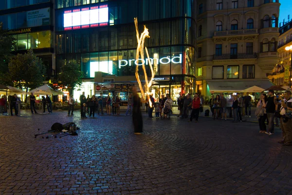 Evening performances of street artists on Wenceslas Square. Fire show