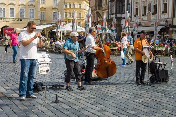 Performance of street musicians performing music in the style of jazz