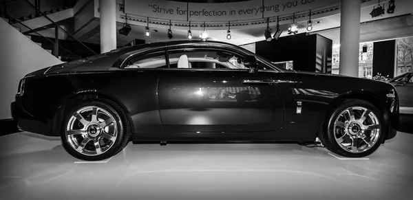 Showroom. Full-size car Rolls-Royce Wraith (2013). Black and white. Side view.