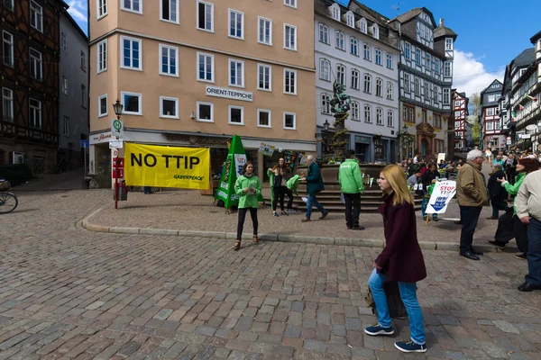 Protest Greenpeace activists in the historic center of the city against the Transatlantic Trade and Investment Partnership (TTIP).