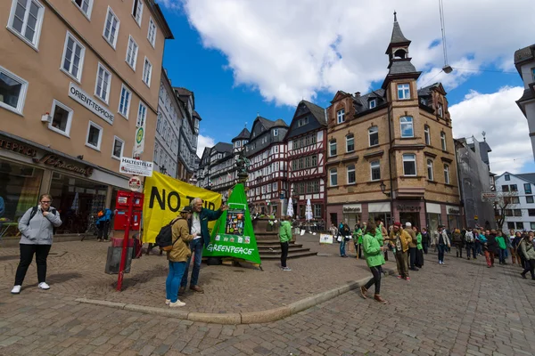 Protest Greenpeace activists in the historic center of the city against the Transatlantic Trade and Investment Partnership (TTIP).