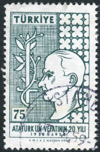 Postage stamp printed in Turkey, dedicated to the 20th death annivercary of Kemal Ataturk, depicted Mustfa Kemal Ataturk and a sword with an olive branch