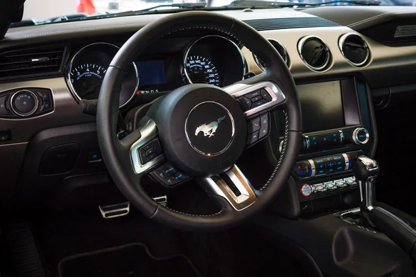 The cockpit of a pony car Ford Mustang 50th Anniversary Edition, 2015. The Classic Days on Kurfuerstendamm.