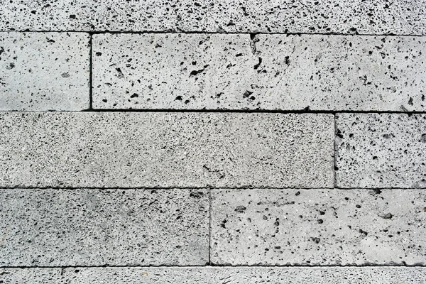 Detail of a wall made of volcanic stone
