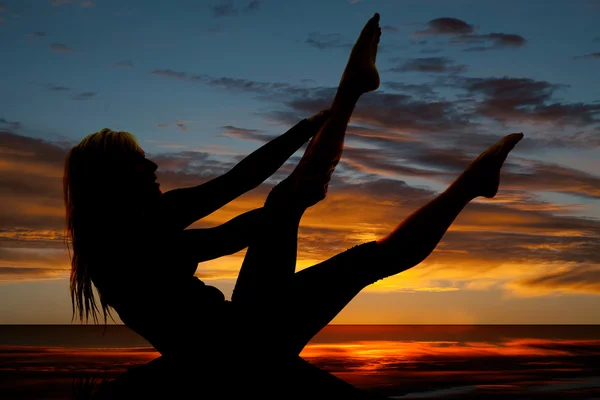Silhouette woman doing yoga