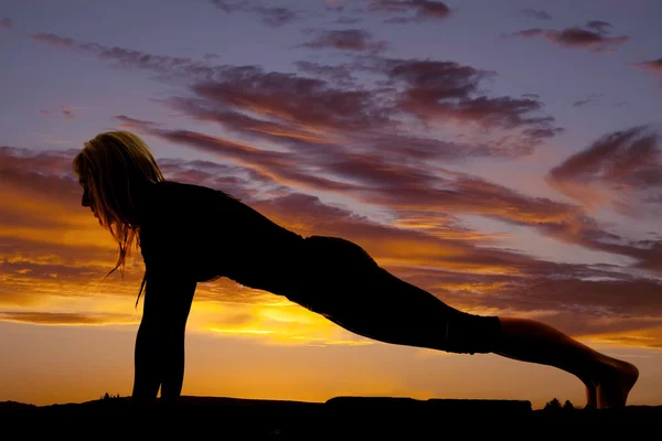 Silhouette woman doing yoga