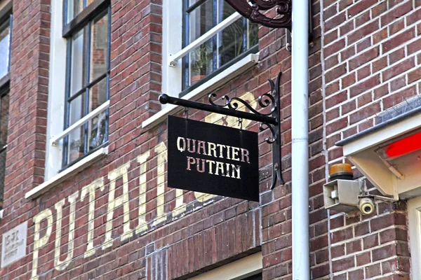 Sign of Quartier Putain cafe in Amsterdam's red lights district