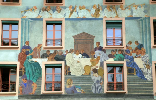 Old beautiful fresco on medieval building in Lucern, Switzerland