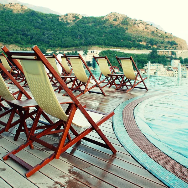 Swimming pool, terrace and outdoor chairs (Montenegro)