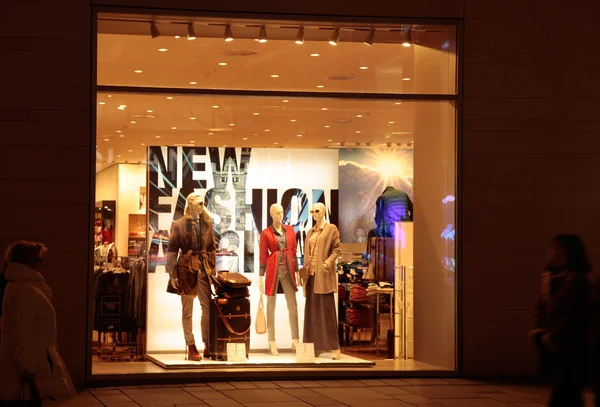 Fashion store window at night in Vienna, Austria.